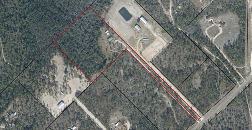 Over 10 acres of land in Southport. Situated off Highway 388, this property is away from the busyness of being 'in town', offering plenty of peace and privacy. This property has a plethora of room for outdoor activities and landscaping. There is an established horse barn with an outdoor arena area. The opportunities are endless. There is a 3 bed, 2 bath mobile home on the property. This home features an open living room, dining area, and kitchen floor plan. The master bedroom is spacious with a private en suite. The master bathroom has a garden tub and separate shower. The two guest bedrooms share a guest bathroom with a shower/tub combo. There is also a large deck out back that is great for hosting friends and family while enjoying the outdoors.