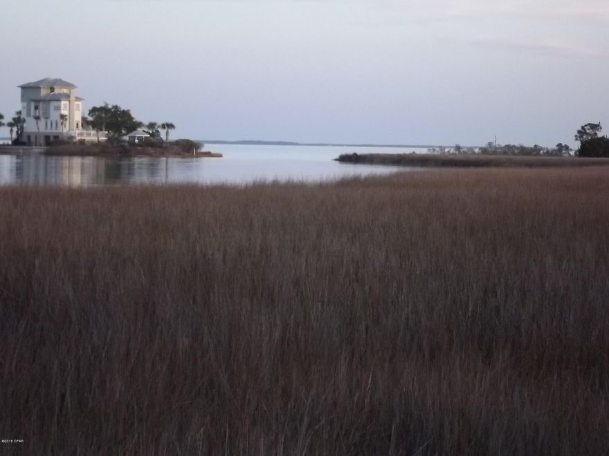 Very nice water front property with a great view of Doty Bayou (Emmons Bayou). The Double wide presently on the property is in very good condition.  This properties zoning is Multi family according to the City of Callaway and there is a possibility of splitting the property in to Two Lots.   There may also be additional land available. In the past the property had a Permitted Dock so any interested party may want to check in to the possibility of re-establishing the dock.