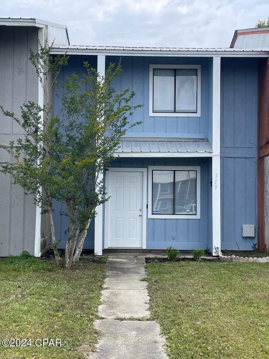 Nice 2bd 1.5ba townhouse that just had a major renovation inside & out. Tile & laminate flooring, new cabinets, all new paint. Large laundry room with W/D hookup. Small private fenced backyard. Garbage included! Small dog ok, restrictions apply & pet deposit required.