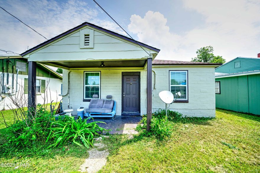 'CURRENTLY UNDER CONTRACT, SELLER WILL CONSIDER BACKUP OFFERS' NEW Photos 10/3/23**Investors & First Time Home Buyers** This two bedroom/one bath Panama City home is for you! It has a new shingle roof, tile flooring and an oversized room with washer/dryer hookups and water heater plus entry to the rear very spacious lawn. The bonus room is large enough it could be utilized as a man cave, craft room or extra storage. It's maintained a consistent renter for several years. Ask for your showing today!
