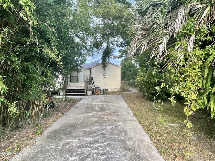 OWNER-FINANCING AVAILABLE. Located on a 0.25-acre lot on a quiet street this 1000+ sqft single-family home features 3 bedrooms 2 baths, hardwood floors, a metal roof, gas connection for heater and stove, plenty of parking space, carport, screened porch, nice shed in the fenced backyard, close to downtown Panama City, shopping, restaurants, schools and much more! From seasoned investors to savvy homeowners, this property delivers a wealth of potential. Call now for your private and exclusive showing!