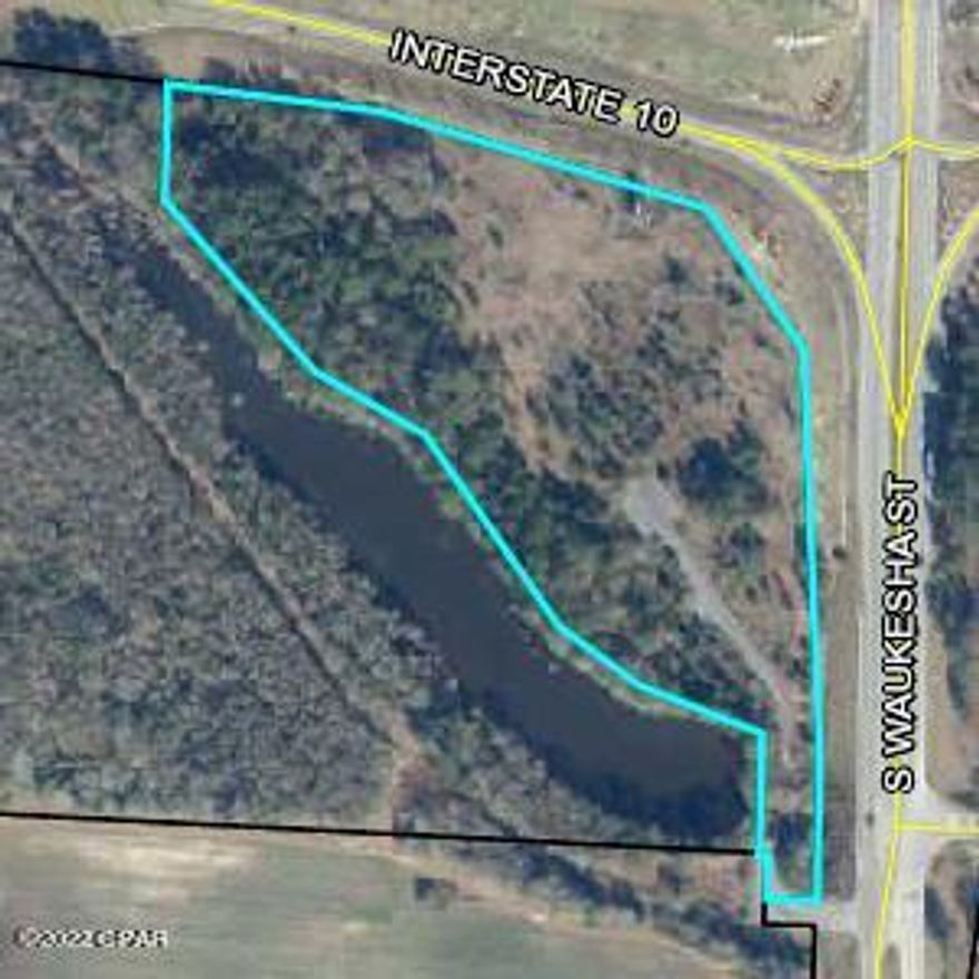 Prime I-10 intersection land, connecting  with Highway 79. Top portion of the parcel is high and dry and buildable for hotel, entertainment, etc. The lower portion of the parcel features a large waterway in need of remediation.