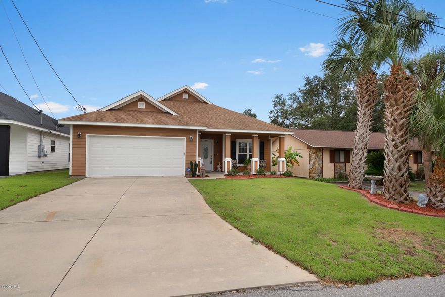 CURRENTLY UNDER CONTRACT, SELLER ACCEPTING BACKUP OFFERS' This Open Sands home will blow you away!!  This well maintained and immaculate home is less than .25 miles to the beach. It features tile floors in the main areas that shine to perfection. The kitchen has upgraded cabinets with soft close feature and granite counter tops.  Stainless steel appliances that look brand new. Beautiful crown molding in the living room. The bedrooms have over sized furnishings with room to spare. At the end of your day relax in your whirlpool master bathtub. Step outside your back door into your screen room.  The screen room over looks the custom saltwater pool and hot tub. This low maintenance back yard has a sprinkler system and pavers. No HOA fees! Centrally located to the beach and Pier Park shopping.