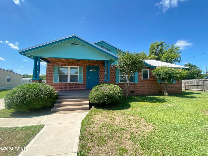 CURRENTLY UNDER CONTRACT, SELLER WILL CONSIDER BACKUP OFFERS Welcome to your dream home in the heart of downtown Marianna! This charming residence boasts 3 bedrooms and 2 full bathrooms, offering both space and comfort for you and your family.

Step into the beautifully remodeled kitchen featuring custom cabinetry and sleek stainless appliances, perfect for whipping up delicious meals. The kitchen seamlessly flows into the sunroom, creating a bright and airy space that doubles as a casual dining area, ideal for enjoying your morning coffee or hosting gatherings with loved ones.

Throughout most of the home, you'll find original hardwood floors that add warmth and character to the space. Large cased openings enhance the open feel of the layout while maintaining the charm of traditional living spaces.

Outside, the fully fenced backyard provides a safe haven for your pets or little ones to play freely. Plus, you'll appreciate the expansive workshop area complete with a sink inside, offering ample space for pursuing hobbies or storing belongings.

Don't miss out on the opportunity to make this your forever home. Schedule a showing today and experience the perfect blend of modern amenities and classic charm in downtown Marianna!