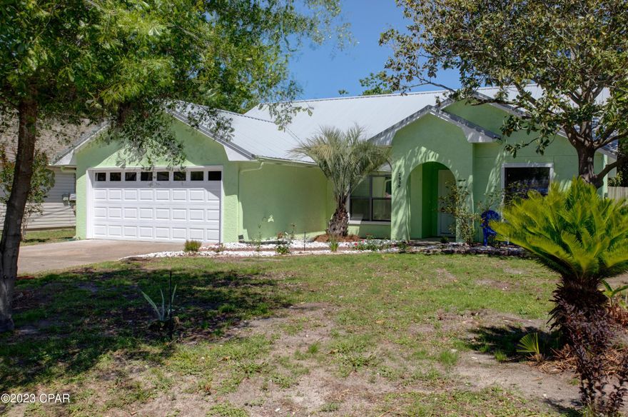 Under Contract - Taking Backups the phrase 'CURRENTLY UNDER CONTRACT, SELLER WILL CONSIDER BACKUP OFFERS'.
Welcome to 2909 Laurie Ave, a charming 3 bed, 2 bath house located in the beautiful Panama City Beach, Florida. Boasting 1168 sq ft of living space, this home offers a cozy and inviting atmosphere that is perfect for families, couples or anyone looking for a peaceful retreat by the beach.

As you step inside, you will be greeted by a warm and welcoming living room that is ideal for spending quality time with loved ones. The kitchen is fully equipped with modern appliances, ample storage space and a quaint dining area.

The three bedrooms offer comfortable accommodations for you and your guests. The primary bedroom features an ensuite bathroom, offering privacy and convenience. The other two bedrooms share a second bathroom, ensuring that everyone has their own space to unwind after a long day.

Outside, you will find a large yard that is perfect for outdoor activities and entertaining guests.  Enclosed sunroom to sit and have your coffee. The property also includes a driveway with a 2 car garage.

Located in the heart of Panama City Beach, this home offers easy access to some of the area's best attractions, including world-renowned beaches, local restaurants, and shopping destinations. Whether you are looking for a permanent residence or a vacation home, 2909 Laurie Ave is the perfect place to call your own. 

New carpet, new floors, new countertops, new paint and all new lighting.  Roof is 4 years old.  
Washer and Dryer convey with home.