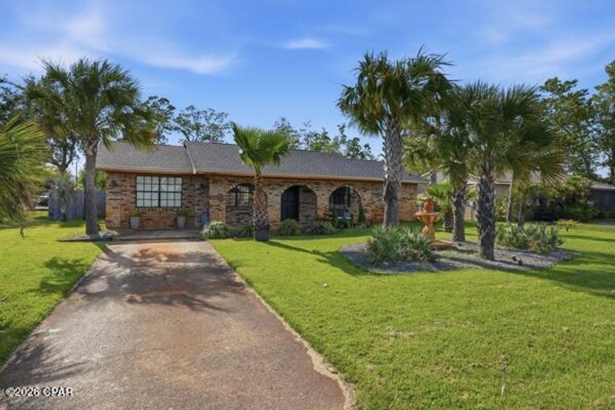 Welcome home to this charming all-brick beauty in the highly desirable Lynn Haven area! Perfectly situated on a large corner lot, this spacious 3-bedroom, 2-bath home offers room for everyone with multiple living areas and endless flexibility.

From the moment you walk in, you'll love the warm and inviting feel, featuring a formal living room, comfortable family room, and a large bonus room that could easily be used as a 4th bedroom, home office, playroom, or guest space. Whether you need room to grow, work from home, or entertain, this home offers options to fit your lifestyle.

The open kitchen is ideal for gathering, complete with a cozy eat-in breakfast area plus a separate formal dining space for family dinners and holiday entertaining. Stylish shiplap accent walls add charm and character, while the beautifully landscaped yard creates fantastic curb appeal.

Major updates have already been taken care of, including updated electrical, a newer roof (2022), A/C system (2021), and tankless gas water heater (2021), giving buyers added confidence and peace of mind.

Step outside to enjoy the fully fenced backyard featuring an above-ground pool, perfect for cooling off on warm Florida days, entertaining family and friends, or simply relaxing at home. The yard also offers side gates for boat, trailer, or oversized vehicle parking, adding both convenience and versatility.

Located close to shopping, schools, dining, and major roadways, this home combines space, comfort, and convenience in one fantastic package.