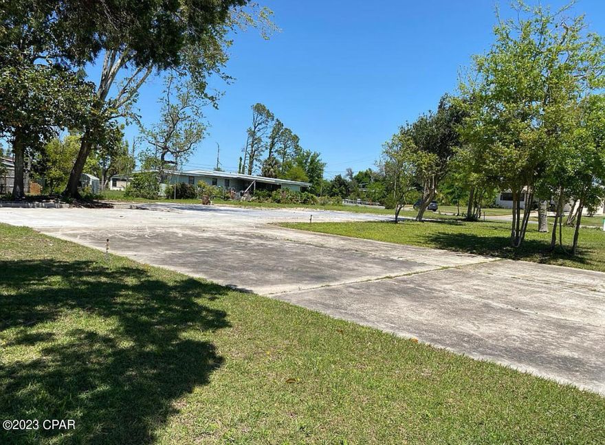 Under Contract seller is willing to consider back up offers. Large vacant corner lot located in the center of town. This lot offers city water and sewer. This property has an existing water/ well irrigation system located on the property. This vacant lot offers grape vines and a mature pecan tree. This land is well maintained and located in the center of town. This property would make an excellent site for your future home. Call for more information today.