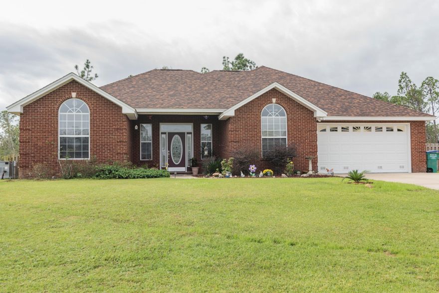 CURRENTLY UNDER CONTRACT, SELLER ACCEPTING BACKUP OFFERS Stunning all brick home with room to grow. This home offers over half an acre to enjoy county living while still being close to town! Many new features of this home include new roof, HVAC system, irrigation system w/shallow well, water heater, tile plank flooring, and fence in back yard. The kitchen appliances are only 2 years old and it even has a 15 KW Energy Standby Generator!This home is better than new and shows pride of ownership.Imagine yourself relaxing with your family in the large living room or cooking your families favorite meal in the spacious kitchen. Morning coffee will be enjoyed in the tiled Florida room overlooking the lush green grass of your extra large back yard.Enjoy the fire pit and work shop.