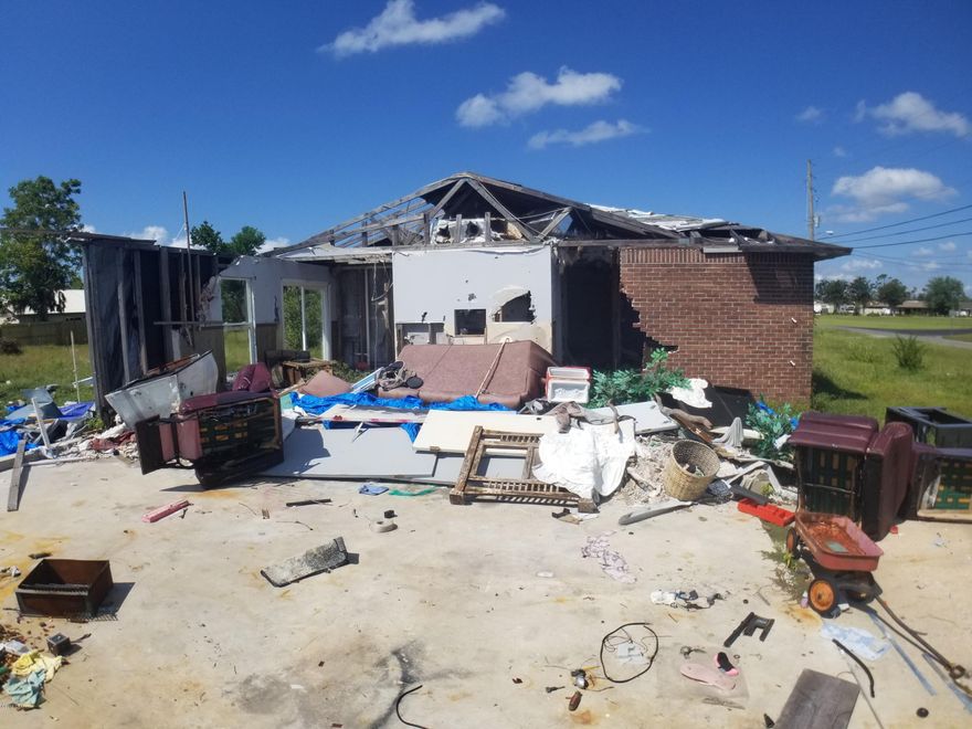 Attention Investors: 1048 sqft, totaled fixer upper property. Foundation and 1/3 of the house still within the property. Great opportunity for the right buyer.