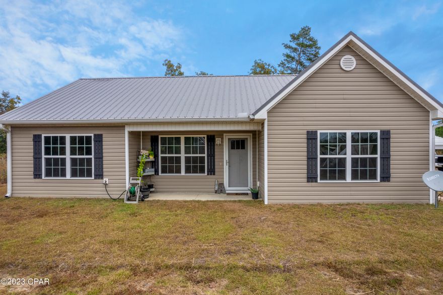 CURRENTLY UNDER CONTRACT, SELLERS WILL CONSIDER BACKUP OFFERS.
Escape to this less than 3 years old charming home sitting on 2.5 wooded acres.  Offering privacy with beautiful sunsets.  Inside discover 3 bedrooms, 2 full bathrooms.  Sleek LVP throughout creating seamless blend of style and functionality.  The main bedroom beckons with its en-suite, boasting  a luxurious soaker tub and tiled shower.  Custom recessed cordless blinds throughout. Come enjoy this home with a nature's beauty at its best!