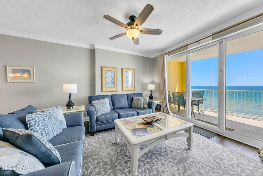 On the BEACH with dream views from the living area and master bedroom!  Great place to live...Great place to escape...and OH, what an investment!  This gorgeous 14th floor unit is beautifully furnished and features updated flooring throughout and an updated walk-in shower in the master bath. Emerald Isle #1403 is meticulously kept, move-in ready and in the ideal building on the west side of Panama City Beach. Enjoy a short drive or bike ride to Pier Park or spend the day along 30A.  This unit has it all - just steps to the sand, incredible Gulf views, updates and location!  See it NOW.   (Although information contained within this listing is believed to be accurate, Buyer is responsible for verifying all information.)