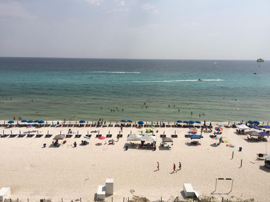 Fully furnished Gulf-Front 1-bedroom, 1-bath Emerald Beach Resort condo for sale in Panama City Beach. Spacious floor plan with extra bunks so sleeps 6. Walkable Pier Park entertainment mall. Private amenities including Beachside Pool, Hot Tub, Tiki Bar, full service Starbuck's, Fitness Center. Food Delivery by Carrabbas Italian Restaurant. Kitchen features granite and GE Profile appliances, under the counter lighting and breakfast bar. Ceiling fans throughout, stackable washer & dryer. Perfect time in our local market to purchase and enjoy equity growth. Come to the beach, you deserve it!