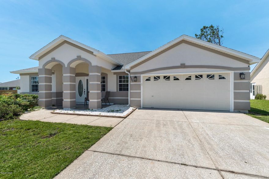 4 bedroom 2.5 bath with in ground pool and Now Move In Ready!! This is a beautiful four bedroom home with 2 full bath and 1 half bath. Large master with walk in closet. Separate Laundry room, living room, dining room and family room with fireplace, screened porch and very nice outdoor kitchen. New interior, new shingle roof and new Carpet just installed. In ground Pool. Lots of interior room and its on a large corner lot in very popular Hammocks subdivision. Its a must see and will be ready to be moved in just a few days. The Hammocks has a community pool and is located in popular Lynn Haven.