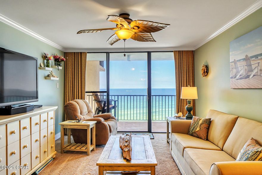 What a gem in Panama City Beach! Pelican Walk is a GREAT pet friendly complex. Enjoy world class views from the generous balcony, living room, dining area, and even the kitchen sink! Non rental unit has been meticulously maintained, is crisp clean, and absolutely turnkey. Loaded with custom upgrades including wainscoting in main hallway, trayed kitchen ceiling, crown molding throughout, and renovated shower in the 2nd bathroom. Stackable load washer and dryer, custom black-out drapes, and plenty of inside storage!  New HVAC in 2019, new refrigerator in 2020, and new sleeper couch this year! Super durable Breezesta polywood chairs on balcony will convey with purchase. Sunset views from the private balcony are some of the finest on the beach and are perfect end to a sunny day and beginning to an exciting evening. EXCELLENT RENTAL INCOME POTENTIAL! With only 10 floors the Pelican Walk offers a casual low key lifestyle. Located on the Thomas Drive away from the congestion, this medium density development has plenty of parking and a rich amenities package including a recently renovated community room, tennis courts, outside grilling area, racquetball court, sauna, and two pools (one heated seasonally). Close to world famous St. Andrews park, fantastic dining, and recreation.  FROM THIS CONDO, YOU ARE WITHIN STEPS OF EVERYTHING YOU COULD EVER WANT AT THE BEACH!