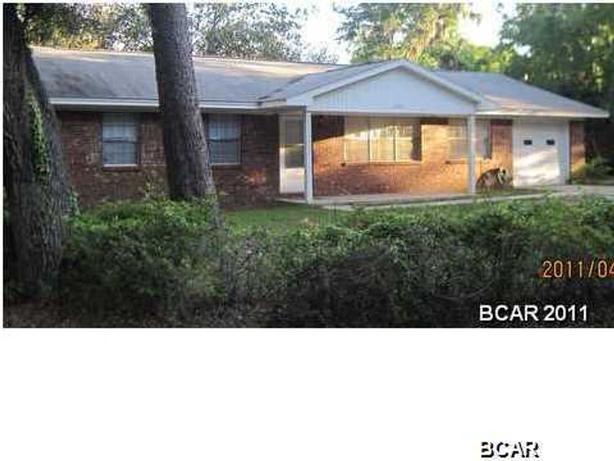 Corner lot allows access to back yard from side of property via West street. Large LR/DR combo with double windows each room, family rm with patio door to large fenced back yard, Kitchen has gas cooktop and wall oven. Inside combination storage and laundry room off kitchen. Master bedroom bath with separate dressing area. All brick house with wooden storage bldg.Close to Parks and Schools.Walk to boat launching area on Martin Lake. Back yard totally fenced.There is well out back and a storage area/shop.