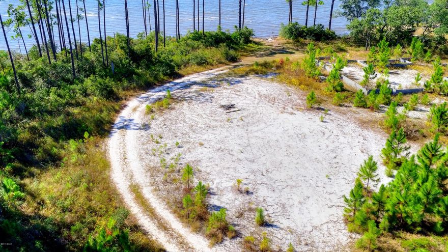 Rare, Rare Opportunity to own 1.59 acres on the water with 210 ft. of water front property. This is the Million Dollar View. Your own beach on East Bay Facing west, for awesome sunsets. This is truly a rare opportunity, for a piece of paradise at this reasonable offering price. If you are looking for water property don't hesitate.