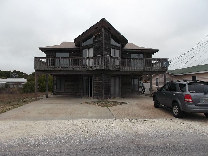 COMING SOON!!!!! Available May 3rd....SHORT WALK TO BEACH!!! Cute home directly across road from the beach. Open floor plan with split bedrooms. Covered carport for parking. Downstairs unit.