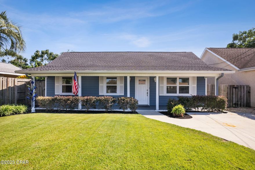 ****UNDER CONTRACT- Taking Back up offers***This immaculate 3 bedroom 2 bath beach home is perfectly located between Front Beach Road and Panama City Beach Parkway in the popular Open Sands community.  Shopping, restaurants, and beach access are just moments away in this golf cart friendly neighborhood. 
The spacious living room offers an inviting open floor plan to the kitchen with a large island and granite countertops throughout. The sunroom is set up with a bar and table games for entertaining. Primary bedroom has a large walk-in closet and ensuite bathroom with floor to ceiling tile walk-in glass door shower. The backyard includes a 7 person Hot Springs salt water spa nestled under a pergola with an 8 foot fence creating a private garden oasis of relaxation. Bonus workshop area accessible from the back yard for extra storage. Improvments to include a new roof in 2019 and double-paned windows in 2022. NO HOA fees in this community. NO Short-term rentals allowed.