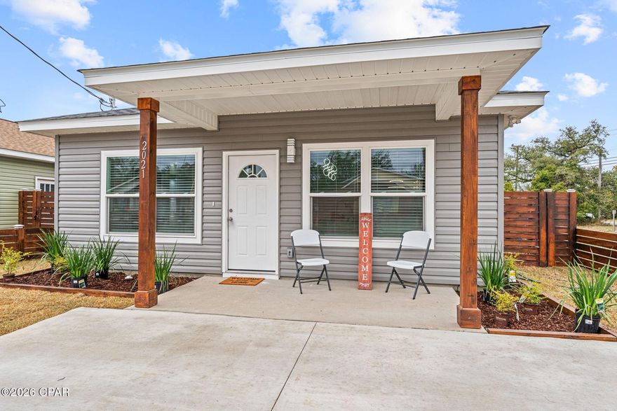 This brand-new, thoughtfully designed home delivers modern style, comfort, and convenience in one of Panama City's most accessible locations. Nestled on a quiet street yet minutes from downtown, dining, shopping, parks, schools, and waterfront attractions, this home offers everyday ease without sacrificing privacy or peace.

The moment you walk in, the home makes a statement. The custom-built entertainment wall anchors the living space with a sleek, modern fireplace and a 55'' TV that complements the home, creating an instant focal point. Built-in shelving with color-changing LED accent lighting allows you to set the tone—bright and energetic for entertaining or warm and relaxed for quiet nights in. This is a space designed to impress and unwind.

Every detail reflects new construction quality and intentional design, making the home truly move-in ready. Whether you're looking for a primary residence, a stylish second home, or a smart investment, this property delivers functionality, atmosphere, and long-term value.

This isn't just a place to live—it's a space to come home to. Schedule your showing and experience it in person!