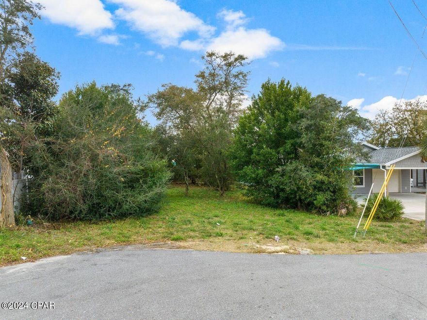 Owner Financing Available! For your consideration is an amazing opportunity to build your dream house in the non HOA, non short-term rental community of Open Sands. Open Sands does not require flood insurance. This lot represents one of the few remaining vacant lots within Open Sands and is located at the end of a quiet cul-de-sac.  Take a moment to drive by this incredible opportunity.