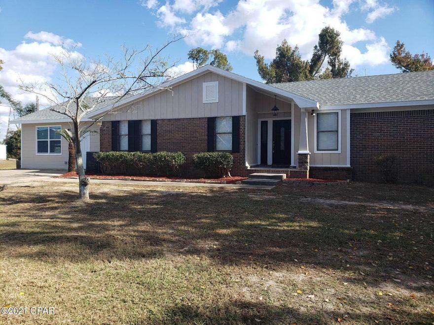 This home is located in Panama City near Lynn Haven. This a brick home is centrally located and convenient to schools and shopping. Stone fireplace, wood floors and custom-built cabinets provide a ton of storage. New paint throughout and many upgrades. Large yard including storage shed for even more storage!