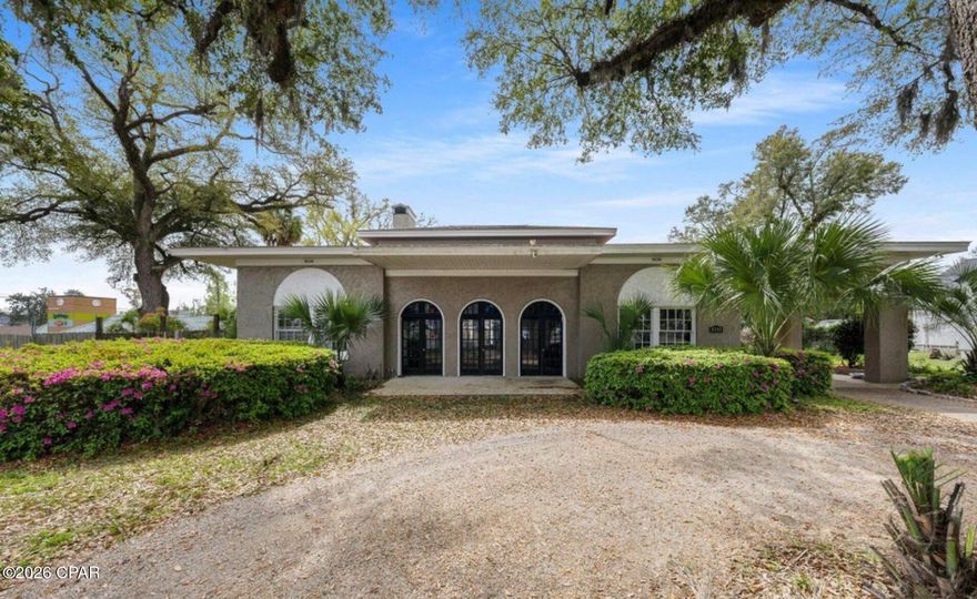 Steeped in charm and history, this beautifully preserved home at 4245 Lafayette Street in historic Marianna, Florida offers a rare combination of authentic character and modern versatility. Carefully maintained to stay true to its original design, the home features period correct details, original craftsmanship, and tasteful updates that bring comfort and functionality into the present day. Ideally situated in a prime commercial corridor, this property's mixed use zoning makes it a standout opportunity for entrepreneurs, professionals, or creative individuals seeking a live work environment. Imagine operating your business from the spacious front professional area of the home with a panoramic view of Highway 90, while enjoying private living quarters in the back of the home, which can be closed off from the front office or converting the property into an inviting boutique, office, or niche flower shop with plenty of space in the back yard to plant and grow your own flowers. With its prominent street frontage, timeless curb appeal, and updates that respect its heritage, this property offers both historic elegance and modern potential. A true Marianna landmark, 4245 Lafayette Street is perfect for those who appreciate history, style, and smart flexibility in one exceptional address.