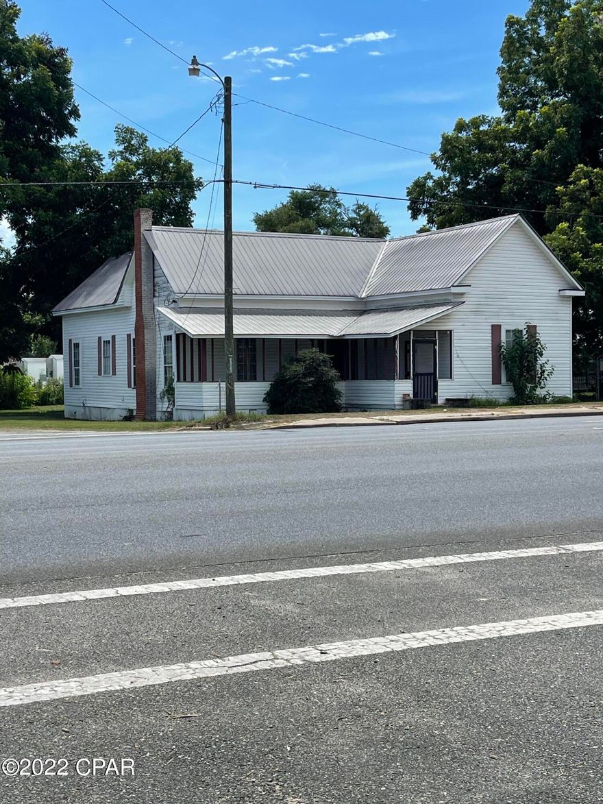 LARGE HOME ON US 231 WITH LOTS OF POTENTIAL! THIS PROPERTY COULD BE CHANGED TO MIXED USE FOR COMMERCIAL/RESIDENTIAL PROPERTY IF APPROVED BY THE CITY IF DESIRED. This property includes 4 lots that could also be separated if desired. Make your appointment to see today!
