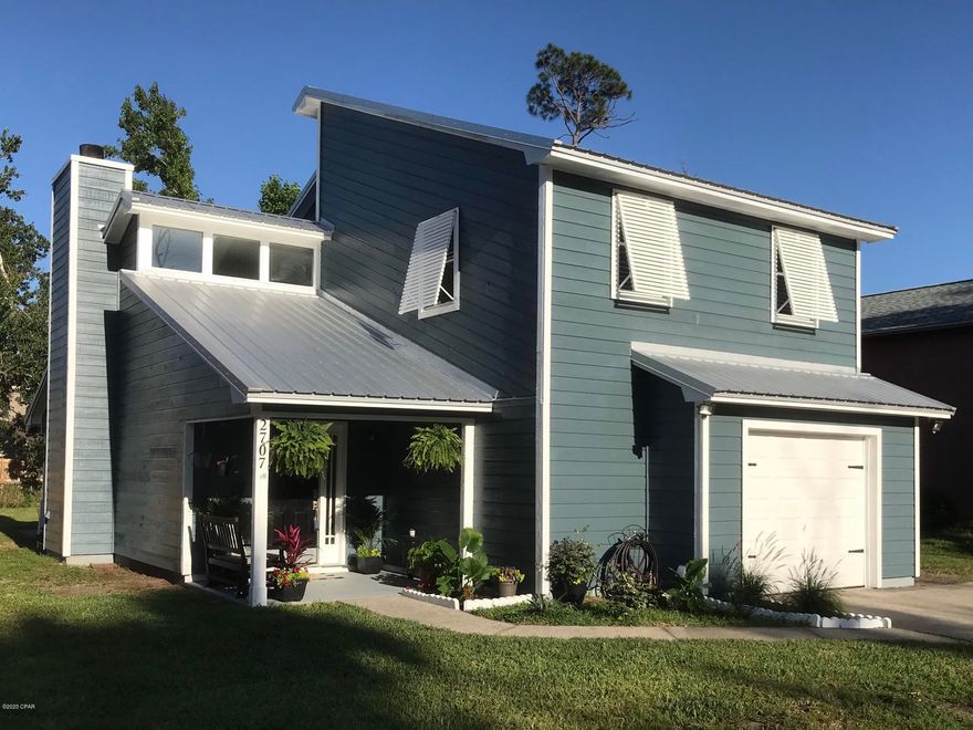 You will be very proud to call this one home!  It has been beautifully renovated and is ready to move into.  Downstairs has a spacious living area with a vaulted ceiling, over-sized dining room and huge kitchen with lots of room for family togetherness.  The fireplace is tastefully decorated with shiplap and has plenty of room for your big screen TV above it.  The master bedroom suite sports a brand new bathroom complete with a trendy barn door.  Everything has been freshly painted, new floors throughout and is in great shape.  It has brand new inside and outside AC units, brand new hot water heater, and a 4 year old roof.  The backyard is ready for barbeques with a covered patio and pavers for the grill and lounging.  It even has a garage.  This may be just what you've been waiting for!