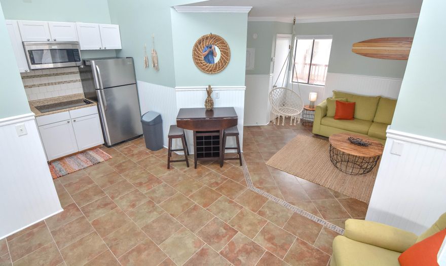 Beautiful unit that has been recently remodeled and updated at Sand Castle Villas. Enjoy gulf views from you living room and kitchen. Low hoa payments of $750/quarterly include cable, water/sewer, exterior insurance and POOL as well as one dedicated parking space. This unit would make a great vacation rental or second home. All furnishings convey to buyer. Sellers are licensed FL real estate professionals.