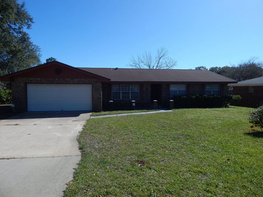 Very quiet neighborhood close to Tyndall A.F.B. Home sits close to Donaldson Point and walking distance to boatramp.  Home features brick all around with 3 bedrooms and 2 full bath. Large dinning area to the left as you walk in or could be an office.  Kitchen is large with an open floor plan overlooking the large family room with fireplace. Windows throughout the living room as  you can watch your kids play in the large screened in Florida room.  Back yard and lot is oversized as owners purchased part of the lot next door.  This home will not last long at this price. This is a probate sale.