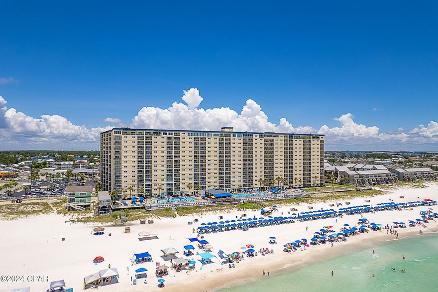 Discover expansive coastal views from the moment you enter this beautifully remodeled condo at Regency Towers. Originally designed as a three-bedroom unit, it has been expertly converted into the largest two-bedroom, two-bathroom configuration in the building to maximize the stunning vistas of Panama City Beach's west end coastline.
The unit is offered fully furnished, featuring ceramic wood-like tiles throughout, newly installed windows and sliding glass doors, solid core doors, and updated major appliances including an HVAC system from 2019 and a recently replaced stove. A front-loading stackable washer and dryer set is conveniently located in the hallway, with the dryer properly vented out.
This short-term rental has exclusively been listed on the Regency Towers COA Website, generating $35k in NET rental income in 2023. Beach chair privileges are included until November 1st, 2024.
Regency Towers has been a beloved destination in Panama City Beach for over 40 years. Situated in the South Lagoon area, it is less than five minutes from St. Andrews State Park and close to local attractions such as Cobra Arcade and Go-Karts, as well as popular eateries like Captain Jack's, Schooners, and Patches Pub. This gated complex boasts extensive amenities, including a children's pool, indoor hot tub, owner's lounge, fitness room, game room, outdoor picnic area with grills, boardwalk, two beachfront pools (both seasonally heated), poolside Bikini Bob's Grill & Bar, and a spacious grassy area. The property offers ample parking and 24-hour security services. All information is deemed reliable but should be verified by the buyer if important. Please note, pets are not allowed.