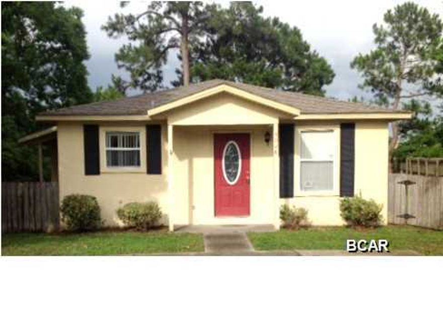 Cottage conveniently located to shops, schools, entertainment and is proved to sell! This 3b/2 bath home just off Hwy 390 is close to everything yet tucked away in a quiet area for your family to enjoy. This home has a large fenced yard with large deck off the back of the house, open concept living room, dining area & kitchen and master bedroom has an en-suite bathroom. It's hard to find these features in a home in this price range and in the Lynn Haven School District. Age, Square Footage, and room sizes approx, if important please verify.