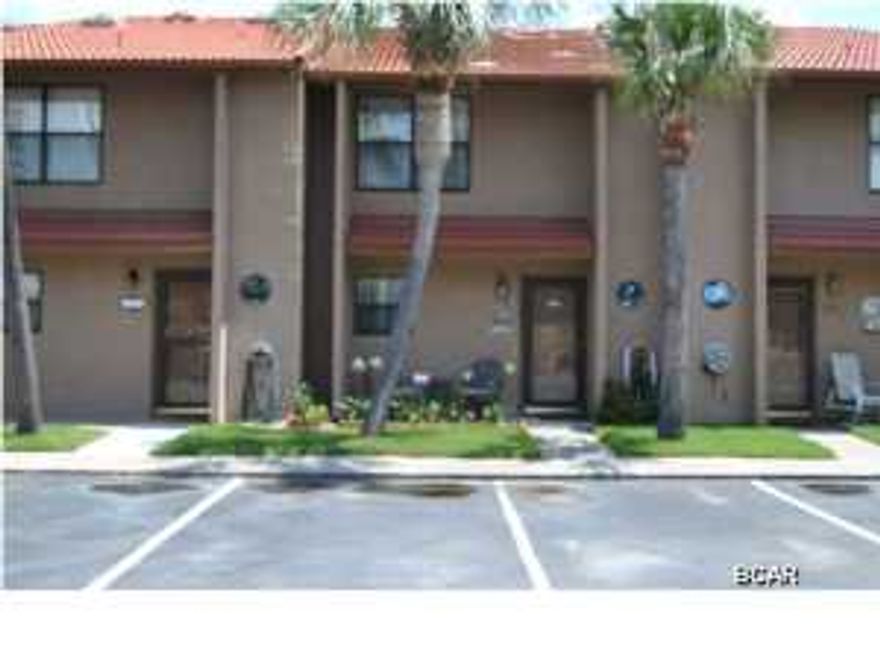 Location is the KEY to your new BEACH home; Located in the second building close to the Beach! Home is located on a low traffic loop with a BEAUTIFUL view of the canal. The back entrance is just steps away from the Lagoon pool and clubhouse. Short walk to the most important reason you are here **THE BEACH**! The master bedroom is extended giving you extra room for a sitting area. Also has a beautiful 7 piece matching wicker furniture package. Nice walk-in closet and garden tub in master bath! All three bathrooms have new American Standard toilets. The kitchen has NEW top of the line stainless steel appliances with an open floor plan for entertaining family and friends. Living area has NEW Lazy-Boy sofa and recliners and ventless gas fireplace for the cool weather days. Tile