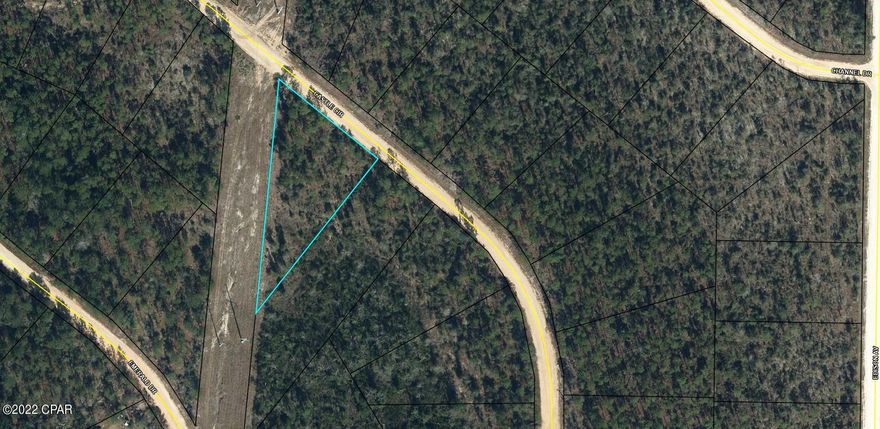 Nice building lot in Unit 5 of Compass Lake. This 1.2 +/- acre lot is mostly wooded and restricted to site built homes only. Modular homes are allowed. For $135 per year you can have access to the amenities of Compass Lake. Approx. 45 minutes to Panama City Beach.