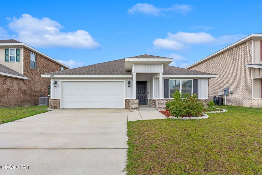 .This beautiful home offers 4 bedrooms and 2 full bathrooms, featuring vinyl flooring throughout the main living areas and plush carpet in the bedrooms. The spacious kitchen is designed for both function and style, complete with a center island, a large corner pantry, and stainless steel appliances including a refrigerator, dishwasher, stove, and microwave. The primary suite is a true retreat, showcasing a soaking tub, separate shower, and a generous walk-in closet. Located in the highly desirable Titus Park community, this home is perfectly situated near everyday conveniences, with Publix, Starbucks, and McDonald's all within walking distance.