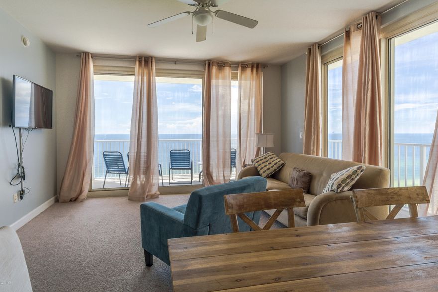 Gulf front condo with wrap around balcony for the best views of pool and sunsets. Now is your chance to own a piece of paradise in the beautiful Shores of Panama. With a 14,000+ sq ft pool, indoor pool, tiki bars, and being on the Gulf of Mexico doesn't leave anything left to be desired! This two bedroom unit with bunk room comfortably sleeps 8 and is rental ready! Comes with deeded parking spot.