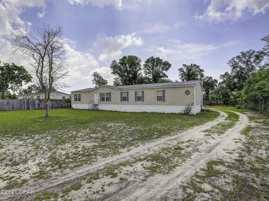 This listing has been entered for informational and comp purposes only.





Damaged Manufactured home sitting on just under half an acre. The home needs a new roof, some drywall/ceiling work an AC and some TLC on the inside.