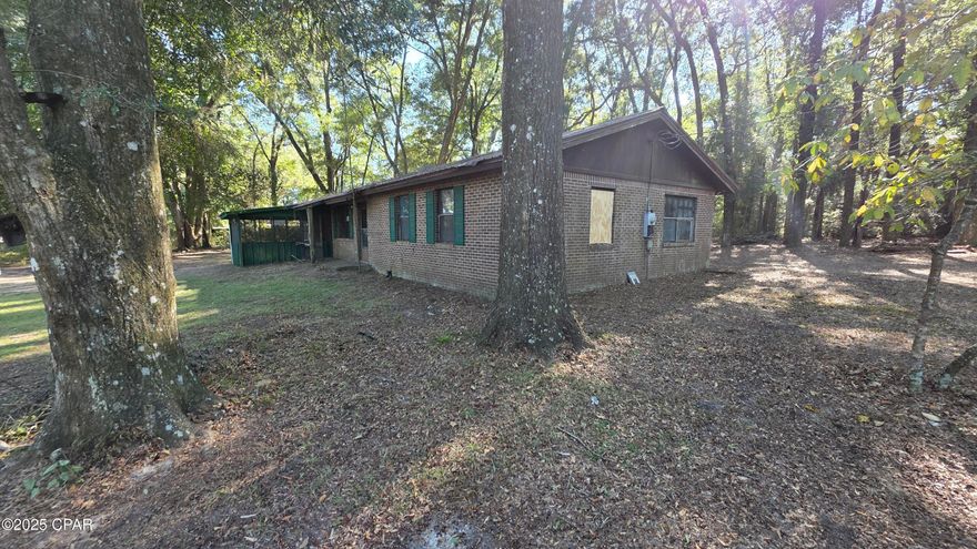 Escape to your own quiet wilderness retreat surrounded by mature oaks and natural beauty. This classic brick ranch sits on a spacious one-acre lot, offering plenty of room to spread out and enjoy the outdoors. Excellent fishing and hunting opportunities are just minutes away, making it the perfect haven for nature lovers.

The home features inviting covered porches—ideal for relaxing and taking in the tranquil surroundings—as well as a large outbuilding for storage, hobbies, or a workshop. With ample parking space and the calm of the countryside, this property offers both comfort and serenity.