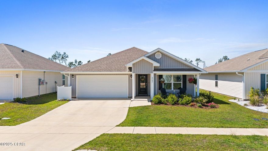 Welcome to 6585 Slabinski Lane, located in the Liberty neighborhood—one of Panama City's newest and fastest-growing communities. This four-bedroom, two-bath Cali floor plan home checks all the boxes with a smart open layout, modern finishes, and plenty of space to stretch out and relax. The kitchen is the heart of the home, featuring stainless steel appliances, a generous island with bar seating, and plenty of cabinet space for all your favorite kitchen gadgets.

This home features custom paint throughout the home, updated fixtures, an additional patio for grilling and sunsets.

The living area flows effortlessly into the backyard, where a large patio and raised garden beds make it easy to enjoy the Florida sunshine. The front porch is an ideal spot for morning coffee or an evening wind-down, with a view of the well-kept neighborhood.

Inside, the primary suite offers a peaceful escape with a water view, walk-in closet, and bathroom with double vanities, a soaking tub, and separate shower. You'll also find additional spacious bedrooms, a laundry room with high-end Samsung appliances, durable vinyl plank flooring in the main living spaces, and a two-car garage with plenty of storage space.

Living in Liberty comes with some serious perks, a new amenity center will be completed this summer which means the neighborhood is going to have 2 swimming pools, a splash pad, basketball and pickleball courts, a fitness center, playgrounds, an outdoor kitchen and pavilion, and a community center for neighborhood events. It's the kind of place where your weekends are just as dialed in as your weekdays.

So whether you're upsizing, downsizing, or just ready for something that feels like less work and more living, this one's got you covered. Come take a look—you might just find your next move.