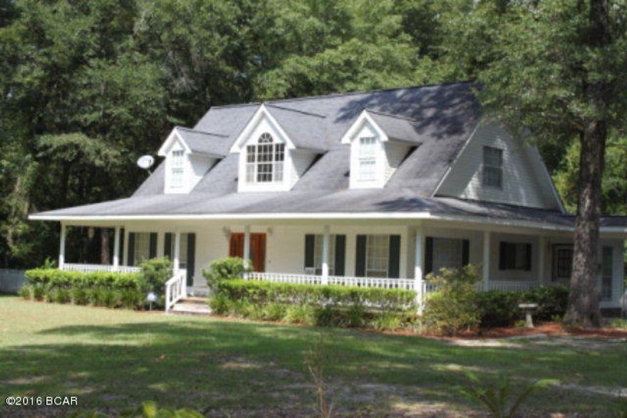 Very attractive home inside and out!!NEW GRANITE COUNTERTOPS!! Relax on the wraparound porch or deck in the backyard. The living room has vaulted ceilings with gas fireplace and French doors leading to the Large fenced backyard, 16x32 gunite pool. Hardwood floors on the first floor and stairs! The kitchen is large with new Granite countertops! Large center island and breakfast area! Formal Dining room with French Doors! The mater bedroom has more French doors leading to the back deck! The master bathroom has a garden tub and double sinks. There is an air conditioned gameroom/bedroom and half bath over the detached garage. Call today for your personal showing.