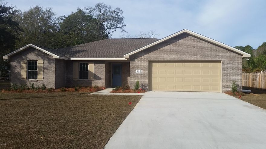 New home nearly complete.  Open floor plan with a lot of light. Custom white Shaker cabinets with Granite counter tops.  Boxed recessed ceilings in living room and master bedroom with crown molding. Wood floors in the master bedroom.  Tile in the living room, kitchen, and bathrooms.  The master bath has a garden tub and separate fiberglass shower.  Nice open deck overlooking the large back yard with landscaping and sprinkler system.