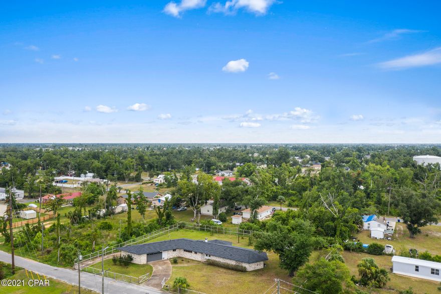 Welcome to 618 Kirklin Avenue, this spacious well maintained 3 Bedroom 2.5 Bathroom home in Panama City sits nesstled back on a large, completely fenced lot. .62 acre. Home offers new roof after HM, beautiful stained concrete flooring, large kitchen with breakfast bar, and eat in kitchen. Living room/ formal sitting area has wood burning fireplace, with sliding glass doors that lead outside to a smaller patio area perfect for enjoying the peace and quiet after a long day. The home's garage has a drive through feature which makes parking a breeze! 



Conveniently located right in the middle between Tyndall Air Force Base and the Beaches. Make your appointment to view today!