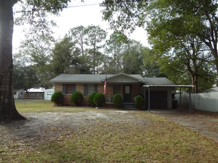 Well maintained Brick home on large lot in the heart of Lynn Haven. Near Lynn Haven Elementary school, this home is very convenient to all Lynn Haven has to offer. Covered porches enhance this homes character and provides for outdoor enjoyment, while the large workshop in fenced backyard is available for all your projects. Home also offers a carport and garage. This property has been well cared for and will be a great investment.