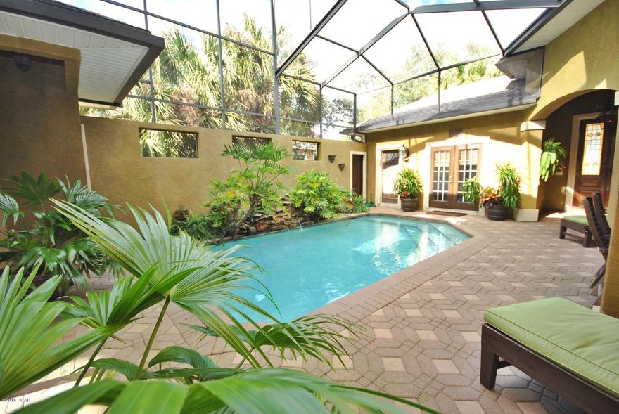 New price and motivated seller!  Come see this spectacular courtyard home in the gated Preserve neighborhood. Seller can OWNER FINANCE,and also open to renting. This beautiful home features 5 bedrooms, 3.5 baths, heated pool with private courtyard, 3 car garage, and a quiet location at the end of a cul de sac. From the moment you enter through antique doors to your enchanting courtyard, you will want to call this your new home.  Enjoy a custom kitchen with wood cabinets, copper sink,a granite island, and plenty of cabinet space.  An open floor plan flows nicely to the dining room, a spacious and oversized family room, and your own wine cellar. You can even slide your glass doors all the way open to the outside, making this home a wonderful place to welcome and entertain.Surround sound is everywhere, even the garage.  The warm and cozy master is on the main floor, has a fireplaceopens with double doors to the courtyard, and has a large master bath with great closet space.  Another feature is the private guestroom off the courtyard, with many options such as an exercise room, study, mother in law room with private bath, cabana, or whatever suits your family best.  There is also a study on the main floor, which can be used as a fifth bedroom or nursery.  Upstairs you have two oversized bedrooms and a full bath, and small loft area.  This second level also features a large balcony that overlooks the courtyard and pool below.  Your outdoor space completes this home as the perfect place to enjoy family and privacy and also welcome and entertain.  The courtyard area is an outdoor oasis, the taste of the outdoors but privacy within your home.  The pool is landscaped, with waterfall; your patio the quintessential place to relax and enjoy serenity or entertain in a beautiful setting.  Call to see this home today!