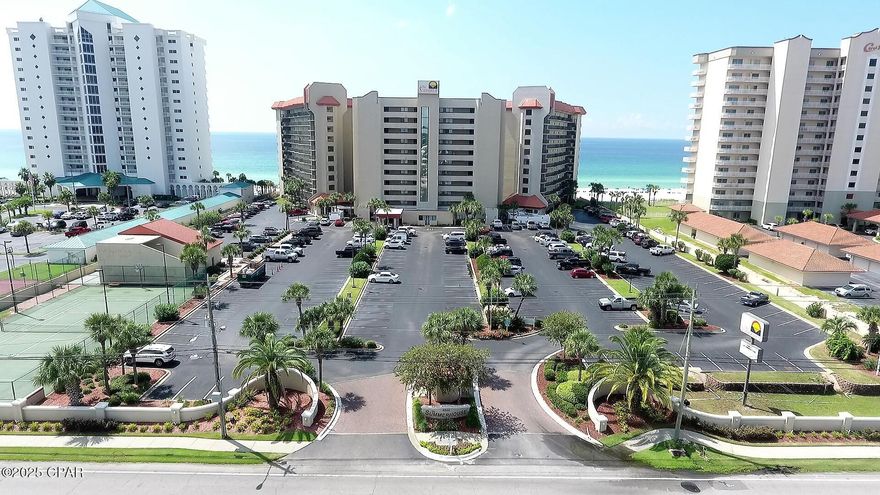 Rarely available Summerhouse ''WRAP-A-ROUND'' Unit. Owners seldom turn loose of these coveted units. If VIEWS are important to you then there is not a better one to be found up and down the beach. You can find larger, more upscale units but you can't find a better view on Panama City Beach. Your view is not obstructed by other buildings or anything else in a Summerhouse Wrap. This is a true unobstructed 180 degree view up and down the beach, not only from the 61-foot balcony but from also inside the unit. This large unit has two master suites with two full baths with an oversized living area.  Summerhouse has a reputation of being a family resort and has guest that have been coming for over 30-years.  The unit is nicely furnished and accented.  It has been a non-rental family unit for a number of years.   A Summerhouse Wrap is all about the views.  Ceiling to floor windows from one end of the unit to the other give you an almost complete 180-degree view.   If you are interested in rental income then the WRAP units are the first choice among visitors.  With normal owner usage rental income should be in the $55K-$75K plus per year and for an owner who handles their own unit their potential revenue can be much higher  Both bedrooms face the beach, one has a king bed in it and the guest bedroom has two full beds in it. 
 The unit has a fully equipped kitchen and has an adjoining pantry.  The countertops, backsplash, harware and cabinets have all been updated.   There is plenty of room in this kitchen for the gourmet chef of a pile of sandwich makers.
 Amenities at Summerhouse include two pools, one which is heated, a kiddie pool, hot tub, gulf front gazebo, handicap ramp to the beach, tennis, pickleball, rachetball, and shuffleboard courts, BBQ area with commercial gas and charcoal grills, a gulf front owners lounge and meeting area, and onsite HOA and rental offices.  The Thomas Dr. location makes it convenient to grocery stores, retail and souvenir stores, area restaurants, and close to most of our areas' fishing, diving, and sightseeing fleets.  St. Andrews State Park is conveniently located at the end of Thomas Dr.
There is nothing better than a sunset over the water and this unit will give you the opportunity for a spectacular sunset every day of the year.
The convenient second floor location makes it ideal for family use or as a high end investment condo rental.  If you are looking for the best view on Panama City Beach you need to see the view from Wrap-A-Round Unit #215 today.
Make Summerhouse, ''YOUR SUMMERHOUSE''
NOTE:  New Washer/Dryer on July 14