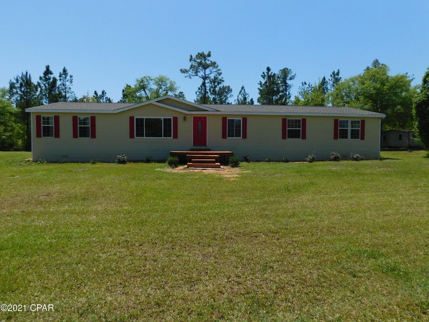 Country Living At It's Best'' This amazing home sits on a spacious 5.57 acres with a

 1 acre pond , fully stocked and spring fed. Lush yard, lots of room for boats, RV's , cars and work shops. You can have horses.

Home has been renovated, starting with out side, new roof, new siding, new covered deck, new porch, some new windows. Inside all new laminate floors, new paint, bath rooms redone, some new sheet rock. home also features 4 bedrooms/2 baths, separate floor plan,  super large kitchen, 2 breakfast bars, dining area, built in's, pantry, stainless appliances.

 Large master bedroom, bath with tub and separate shower , walk in closet. Large den 29.5x14.5/ fireplace, bar area/  refrigerator. large laundry. 2 out buildings w/power.

 Close to schools, Pond Lake /boat ramp, fishing.