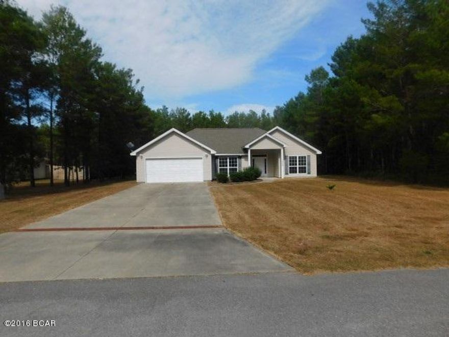 2006 Ranch in the Florida panhandle is situated on over 1 acre! It offers 3 bed, 2 bath, with more than 1750 square feet of living space, and an attached 2 car garage. This move in ready home with an open floor plan features wall to wall carpet, high vaulted ceilings, neutral paint, and comfortably sized bedrooms. The eat in kitchen has ample storage, good prep space, a high top breakfast bar, and dining nook. This one will not last long. Make an offer before it's gone! This property is bank owned.  It is sold in “as-is” condition without repairs or warranty.  Buyer is responsible for verifying all information contained in this listing.