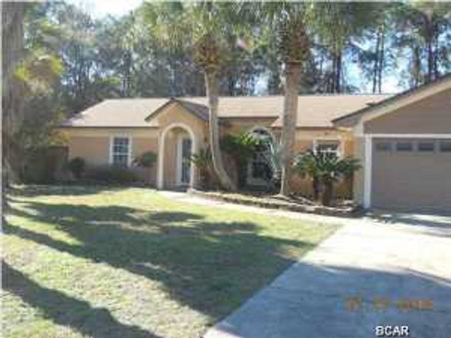 Located in the desirable Treasure Palms subdivision just off Laird St. Nice open split floor plan , Living room has gas fireplace and cathedral ceilings and french doors leading out to your in ground pool. Privacy fenced back yard. Master bedroom has a private bath with huge walk in closet. This home has lots of potential but needs some TLC.