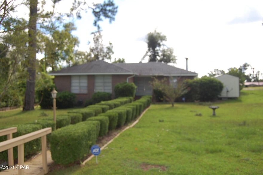 PRICE REDUCED! BEING SOLD AS IS. Nice 4/2 brick home with enclosed sparkling pool located in town and convenient to schools, hospital and shopping. Needs new flooring and updating but very nice home for young family.