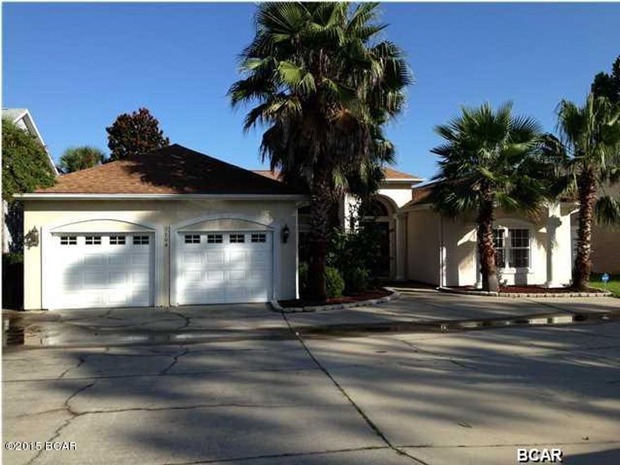 Elegant Panama Country Club home on quite street overlooking #16 and #13 Golf Holes and small lake...Interior and exterior was completely remolded within the past four years including new roof, new interior paint, new flooring, new 4th bedroom, new family room, new foyer, and new landscaping...Interior features formal dining room, formal living room, kitchen with granite tops and breakfast area, large family room overlooking golf course and small lake, master bedroom with double vanity, separate shower, garden tub, and two walk-in closets, 4th br with own bath and walk-in closet, custom wood plantation shutters, built-in speakers in most rooms, fireplace, 10 ft ceilings, and security system...Exterior features two car garage with golf cart door and extra storage room, new landscaping, seawall, sprinkler system, circle drive, two ac/heat units, and new roof...All ages and sizes are aprox including sq ft.